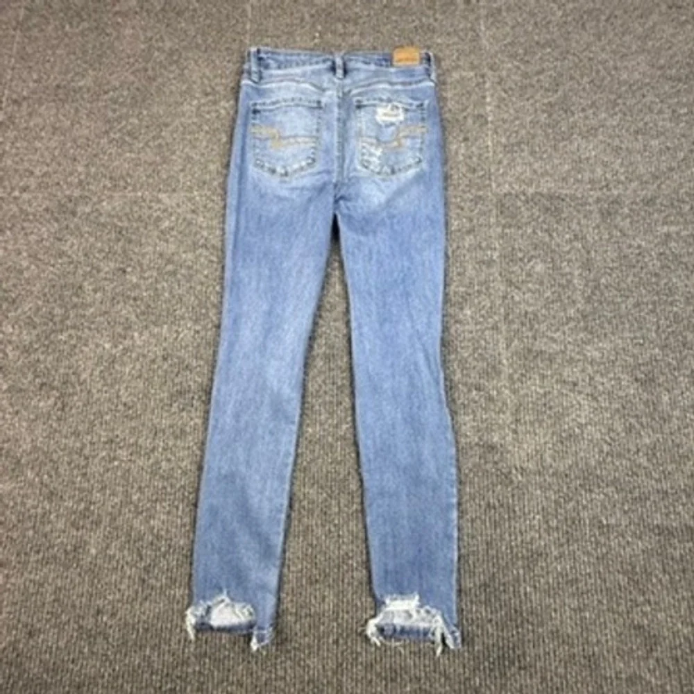 American Eagle Super Hi-Rise Jegging Womens 4 Blue Distressed Next Level Stretch